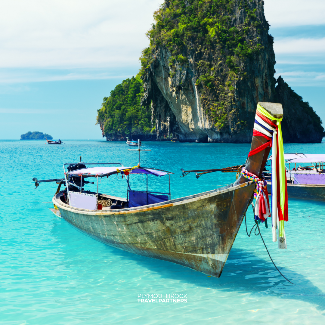Long-tail boat in the turquoise waters of Thailand